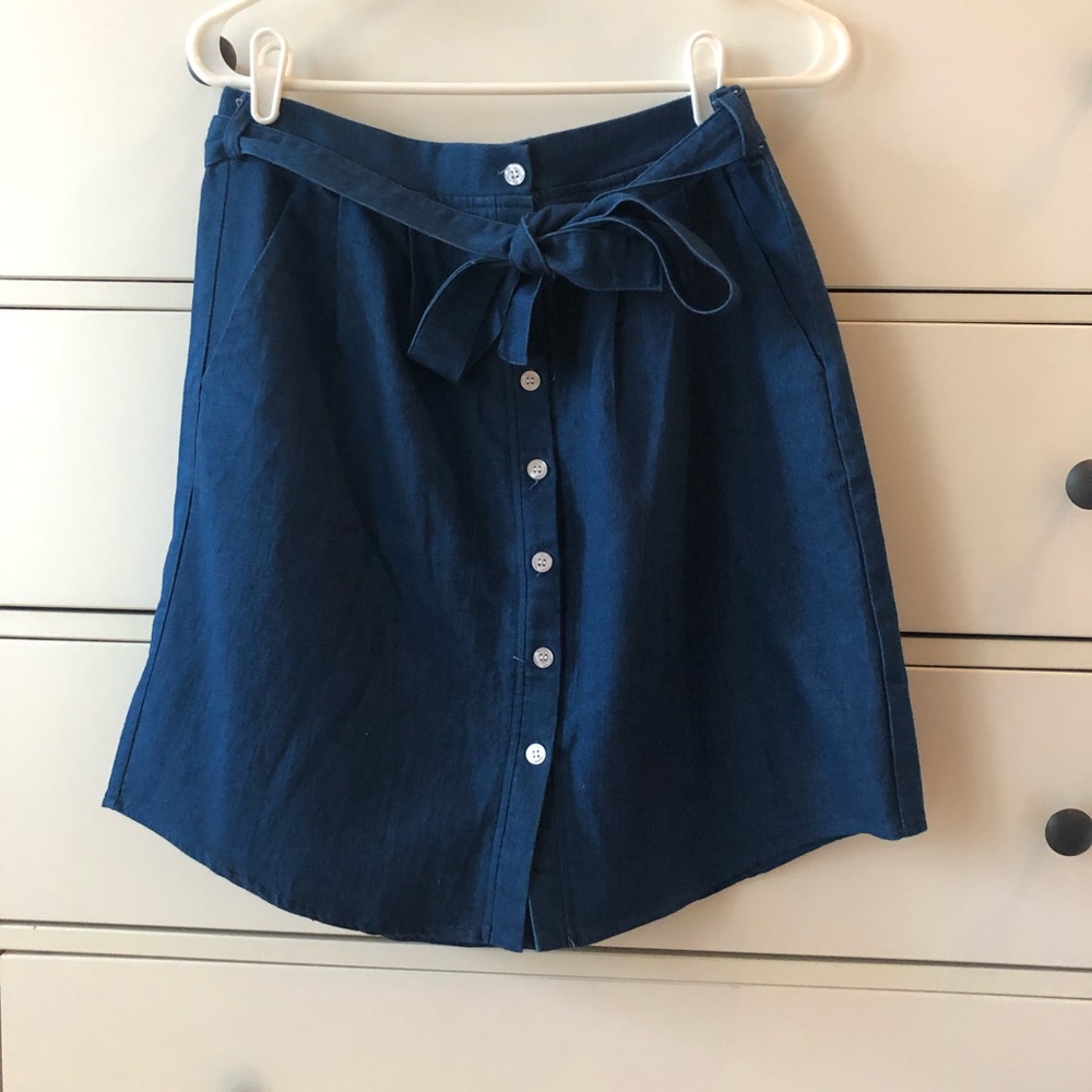 Denim button-up skirt by Onze-Montréal